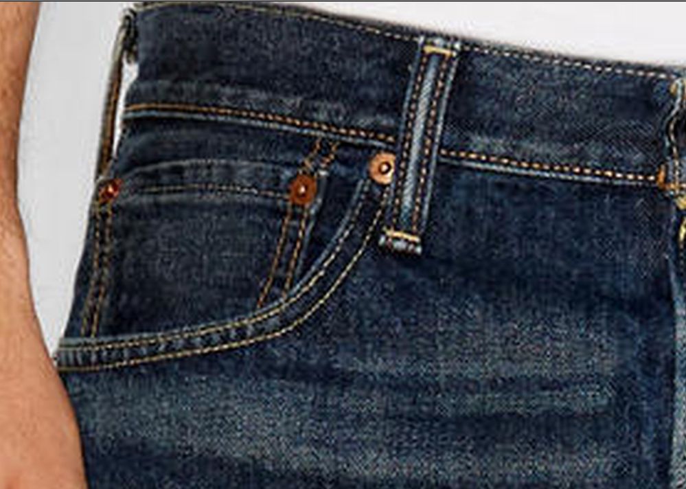 why small repeat buttons in jeans pocket